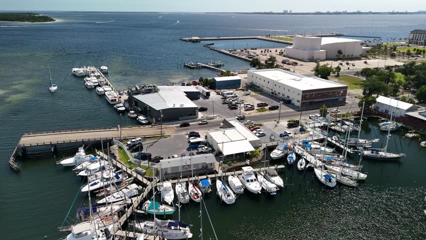 Luxury Yachts Docked Over Bristol Harbor Marina With Bascule Bridge In Panama City, Florida USA. Aerial Shot