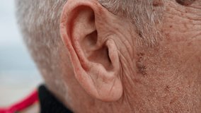 Ear Of A Middle Age Man Close Up  - Powered by Shutterstock - Get 15% off with code: PIKWIZARD15