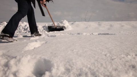 Shoveling snow off the driveway