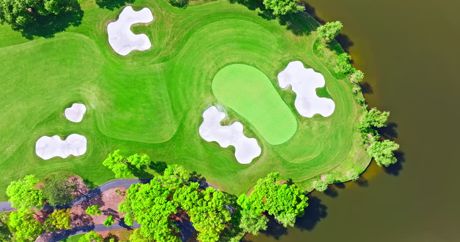 Aerial view of green golf course natural landscape in summer. top view.