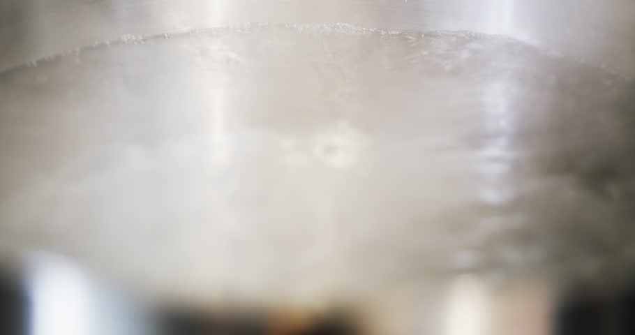 Pot of boiling water in kitchen