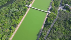 Aerial drone footage of the rowing canal in Plovdiv. Sports facility for rowing in the heart of the recreation and culture park in the second largest city of Bulgaria. Boat racing venue. flyover
 - Powered by Shutterstock - Get 15% off with code: PIKWIZARD15