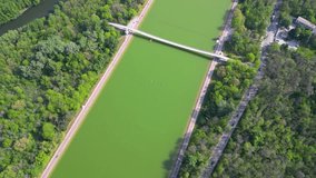 Aerial drone footage of the rowing canal in Plovdiv. Sports facility for rowing in the heart of the recreation and culture park in the second largest city of Bulgaria. Boat racing venue. flyover
 - Powered by Shutterstock - Get 15% off with code: PIKWIZARD15