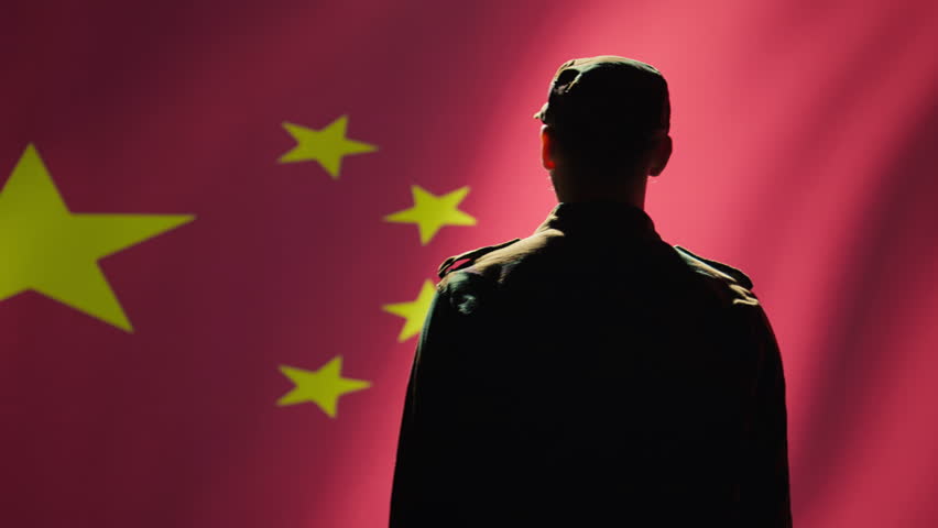 Member of chinese army doing saluting hand gesture towards China flag in command center, showing respect. Military unit in uniform serving Chinese Communist Party, doing honoring gesturing, camera B