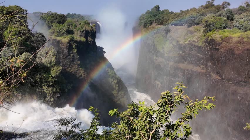 Victoria Falls At Livingstone Northern Rhodesia Zambia. Cascade Mountains Livingstone Northern Rhodesia. Waterfall Sky Clouds Landscape Waterfalls.