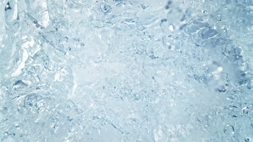 Super Slow Motion Shot of Pure Water Followed by Camera Splashing into Surface at 1000fps.