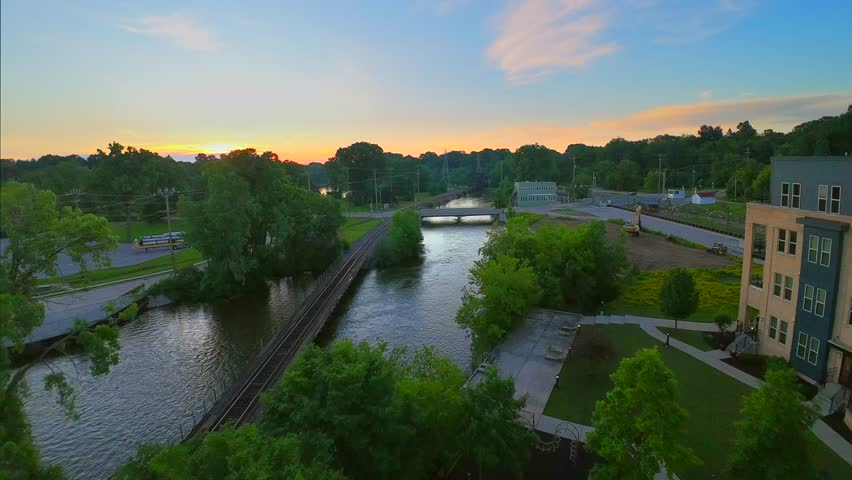 Scenic FPV drone fly under bridge and through railroad Trestle, early morning.