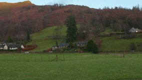 Quaint cottages and lush greenery in the picturesque Lake District countryside - Powered by Shutterstock - Get 15% off with code: PIKWIZARD15