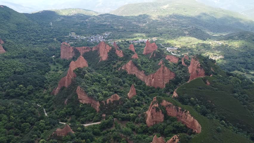 Aerial images of Red Canyon Las Medulas (Ponferrada, Spain). Roman gold mine. UNESCO World Heritage Site. Natural landscape. Reddish mountains