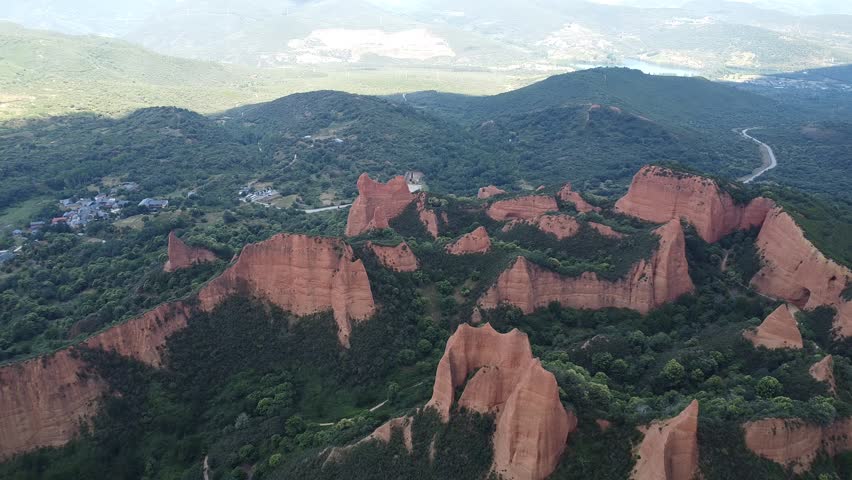 Aerial images of Red Canyon Las Medulas (Ponferrada, Spain). Roman gold mine. UNESCO World Heritage Site. Natural landscape. Reddish mountains