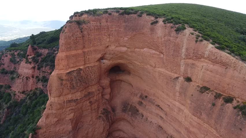 Aerial images of Red Canyon Las Medulas (Ponferrada, Spain). Roman gold mine. UNESCO World Heritage Site. Natural landscape. Reddish mountains