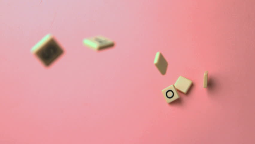 Letter pieces spelling questions coming together in slow motion