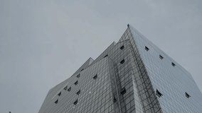 Modern financial building. Corporate business, high skyscraper glass surface. Real estate for rent and commercial using. Facade of an modern glass office skyscraper building - Powered by Shutterstock - Get 15% off with code: PIKWIZARD15