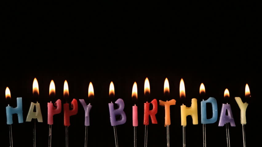 colourful happy birthday candles being extinguished Stock Footage Video ...