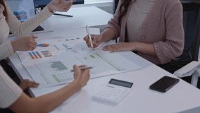 Diverse business team analyzing financial data in a slow-motion meeting. Making data-driven decisions for company growth - Powered by Shutterstock - Get 15% off with code: PIKWIZARD15