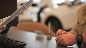 Cropped shot of unrecognizable business people handshaking after negotiation for deal and acquisition sitting at desk. Closeup of businessman and businesswoman sign contract agreement on paper. - Powered by Shutterstock - Get 15% off with code: PIKWIZARD15