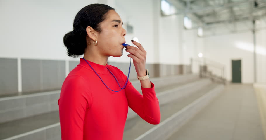 Woman, swimming coach and blowing whistle in indoor aquatic center with communication for lesson. Female person, trainer and instructor as teacher with smile, gesture and done with session by pool
