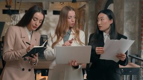 Emotional busy concentrated business women three multiracial multiethnic females diversity businesswomen Asian Japanese Chinese Korean Caucasian girls in office documents laptop discuss brainstorm - Powered by Shutterstock - Get 15% off with code: PIKWIZARD15