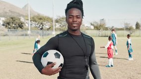 Man, face and coach at training with soccer ball for pride, teaching and outdoor for development. African person, excited and portrait for mentor, exercise and smile with sport for fitness on field - Powered by Shutterstock - Get 15% off with code: PIKWIZARD15