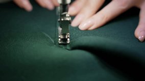 Hands of seamstress sew clothes on fabric. Clothing detailing concept. - Powered by Shutterstock - Get 15% off with code: PIKWIZARD15