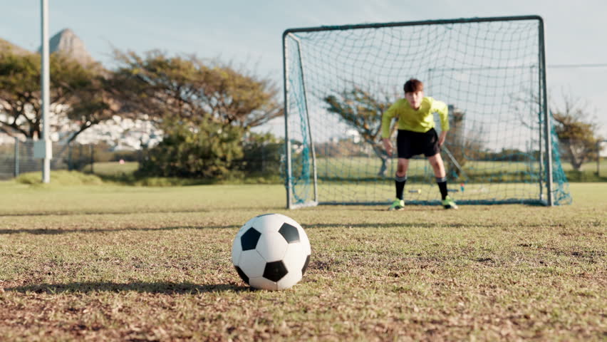 Children, soccer and score for happy game, goalkeeper and jump for save with shooter for goal celebration. Exercise, win and excited team players, sports and activity with energy on football field - Powered by Shutterstock - Get 15% off with code: PIKWIZARD15