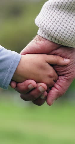 Holding hands, grandparent and child in park with trust, love and bonding on outdoor walk in nature. Family care, generations and old person with kid in garden together, relax and respect in support
