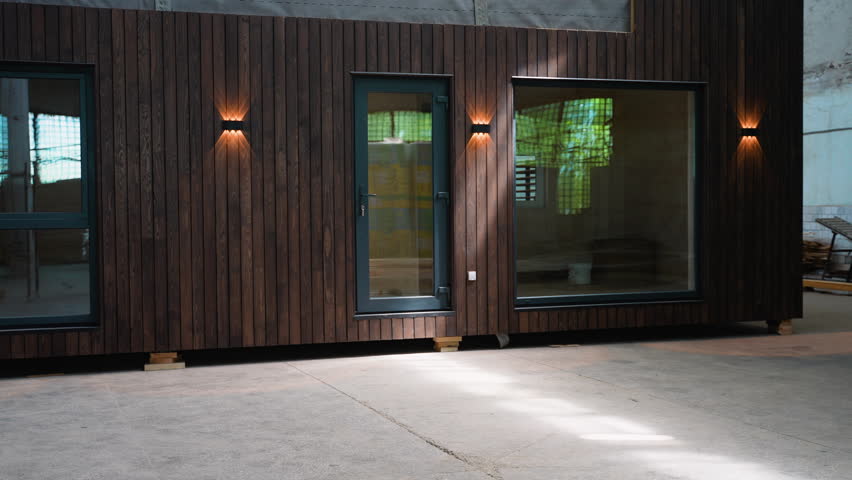 Prefabricated modular mobile wooden house at construction site