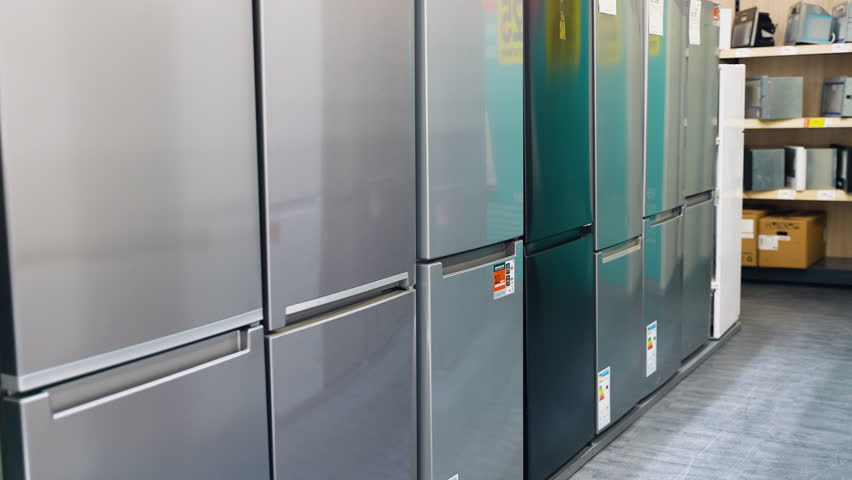 Rows of fridges in household appliance store