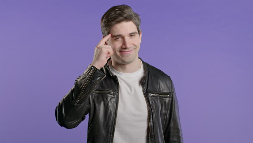 Handsome clever man with gesture - you, think about it. Looking camera on violet