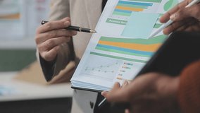 Business meeting time,business account managers crew working with new startup project,report analysis cost graph on desk at meeting room. - Powered by Shutterstock - Get 15% off with code: PIKWIZARD15