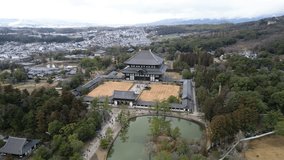 Aerial view of Nara Park where you can see the temples and parks - Powered by Shutterstock - Get 15% off with code: PIKWIZARD15