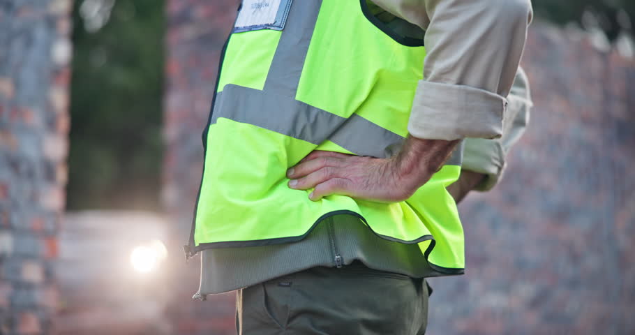Hands, back pain and architect man with injury, joint and spine inflammation from arthritis. Construction worker, hurt and tension from manual labour for male person and medical accident on job site