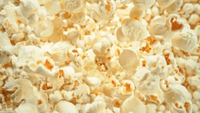 Super Slow Motion Shot of Falling Fluffy Popcorn Followed by Camera at 1000 fps. - Powered by Shutterstock - Get 15% off with code: PIKWIZARD15