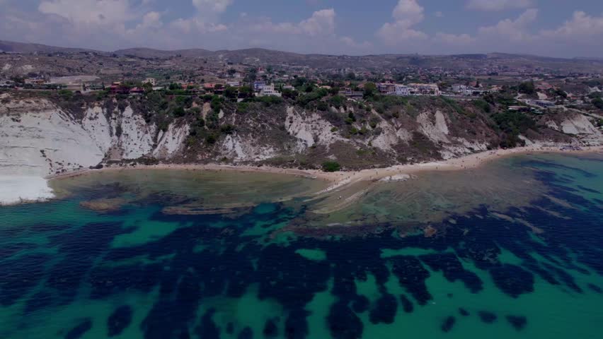 Aerial reveal white cliffs in Mediterranean Sea Scala dei Turchi, Sicily