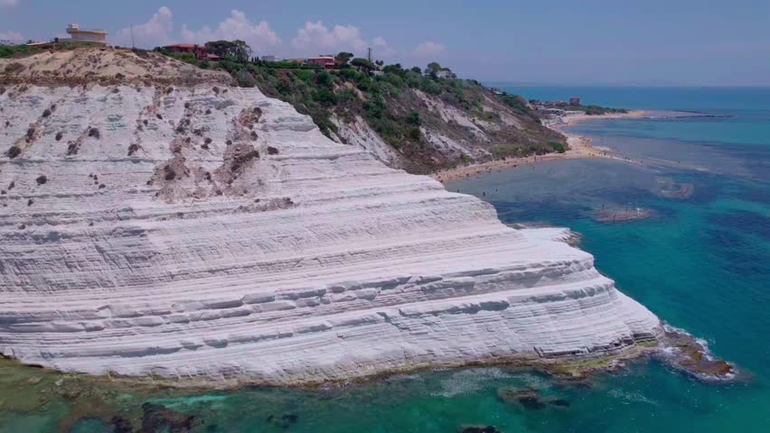 Close-up Scala dei Turchi white rock surrounded my ocean, Sicily