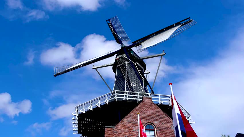 High quality clip of the traditional windmill De Adriaan in the city of Haarlem, North Holland, Netherlands.