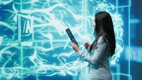 Computer scientist using artificial intelligence computing simulating human brain thought processes. Indian employee working on tablet, developing AI machine learning algorithms, camera A - Powered by Shutterstock - Get 15% off with code: PIKWIZARD15