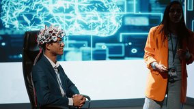 Speaker does EEG headset presentation during tech convention, demonstrating successful implementation of AI in driving forward startup businesses, sharing latest neuroscience discoveries, camera A - Powered by Shutterstock - Get 15% off with code: PIKWIZARD15