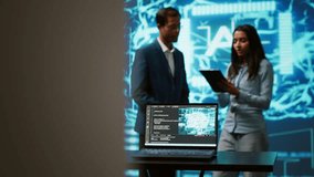 Engineers use AR tech to visualize AI neural networks brain, solving company problems. IT professionals using artificial intelligence augmented reality hologram, camera A - Powered by Shutterstock - Get 15% off with code: PIKWIZARD15