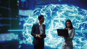 Engineers use VR smart goggles and AI neural networks to solve company problems. IT experts using artificial intelligence and AR virtual reality tech to visualize startup business data, camera B - Powered by Shutterstock - Get 15% off with code: PIKWIZARD15