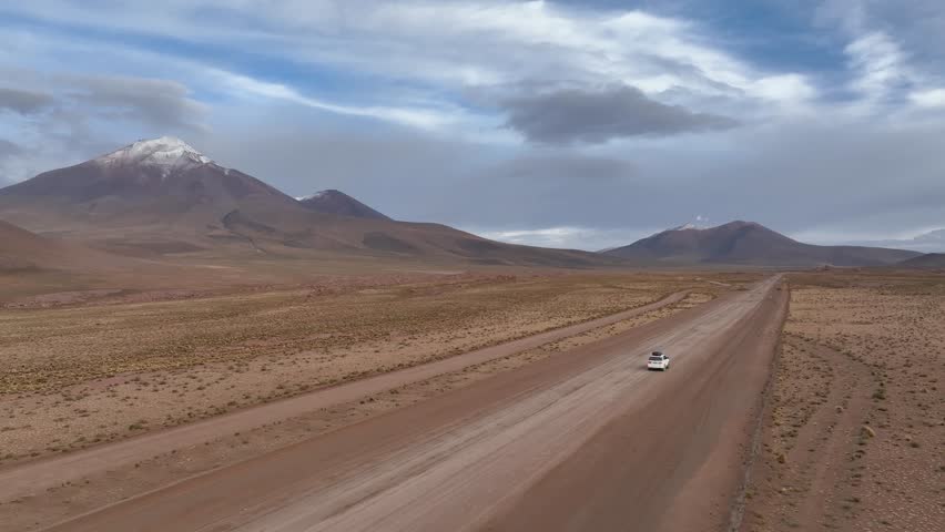 Atacama Desert, Chile. Car on the road. Aerial view by drone.