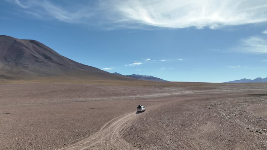 Atacama Desert, Chile. Car on the road. Aerial view by drone.
