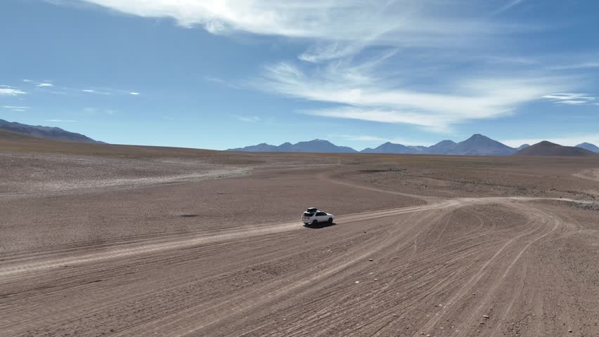 Atacama Desert, Chile. Car on the road. Aerial view by drone.