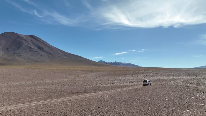 Atacama Desert, Chile. Car on the road. Aerial view by drone.
