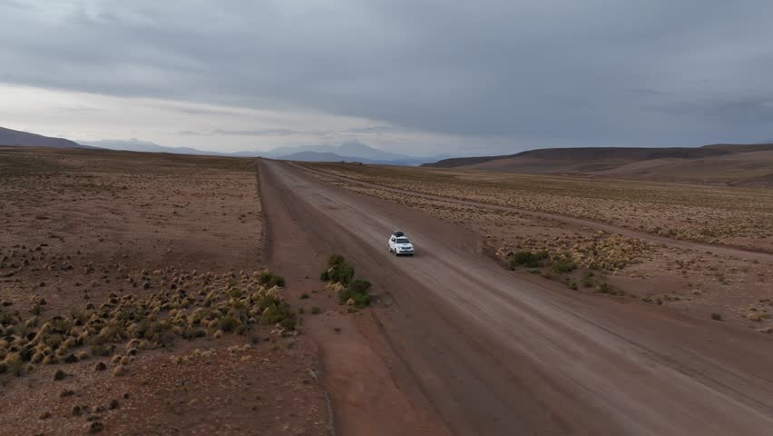 Atacama Desert, Chile. Car on the road. Aerial view by drone.