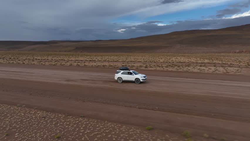Atacama Desert, Chile. Car on the road. Aerial view by drone.