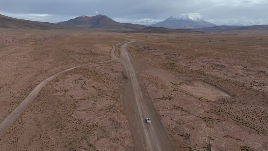 Atacama Desert, Chile. Car on the road. Aerial view by drone.