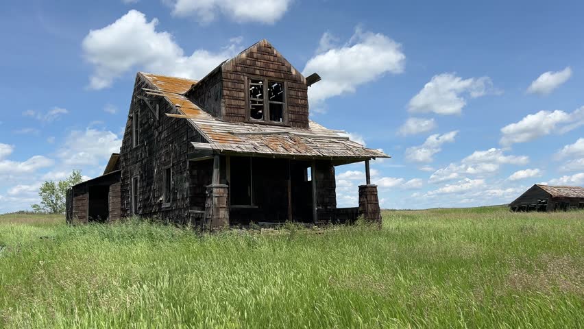 Old abandoned farmhouse on the prairies of Alberta. 
