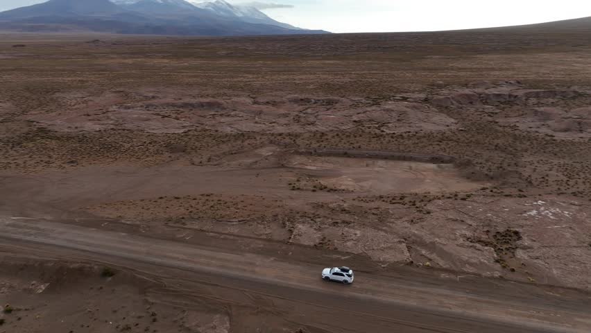 Atacama Desert, Chile. Car on the road. Aerial view by drone.