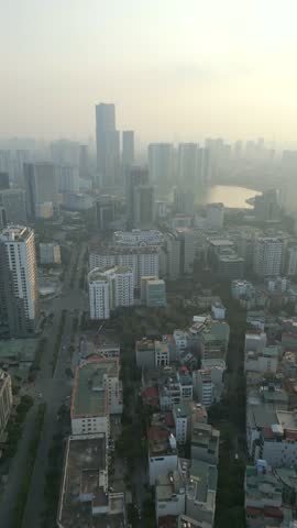 Aerial view of the air polluted skyline of Hanoi city at dawn, Vietnam